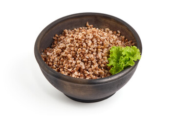 Buckwheat in a pot, isolated on white background.