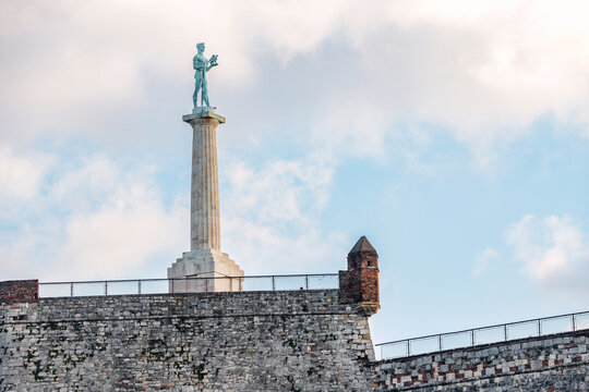 29 November 2023, Belgrade, Serbia:  imposing Victory Pobednik Monument, with its towering column and intricate sculpture