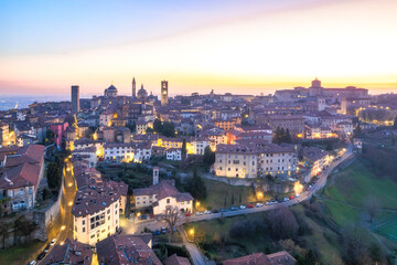 High point of view at buildings in Bergamo Alta during dusk, Lombardy Italy.