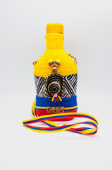Souvenir bottle with  Colombian flag pattern 