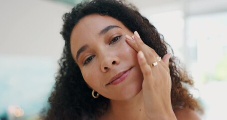 Woman, face and mositurizer for skincare or beauty with smile, self care and cosmetics in bathroom of home. Person, cream and happy with sunscreen for morning routine, dermatology or facial treatment