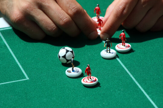 Subbuteo, a board game in which the sport of football is reproduced in miniature