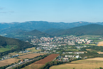 Fototapeta na wymiar Roznava city with hills of Slovenske rudohorie above from Brzotinska skala viewpoint in Slovakia