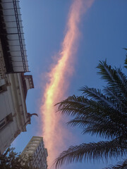 sky with beautiful elongated cloud in blue sky