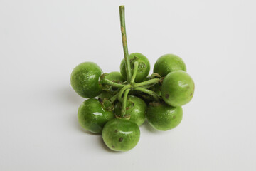 Fruit of Solanum nigrum, the European black nightshade or leunca, isolated on white background
