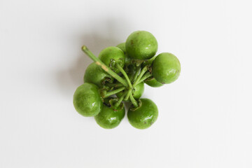 Fruit of Solanum nigrum, the European black nightshade or leunca, isolated on white background