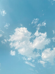 Sky and fluffy cloud scenery in the morning is incredibly calming to start the day,sky and fluffy white cloud made me feel relaxed,sky and fluffy cloud scenery take a majestic and breathtaking beauty