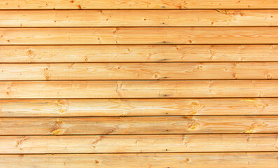 Fototapeta premium Wooden boards on the wall as an abstract background. Texture