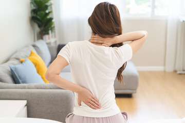 Pain body muscles stiff problem, asian young woman painful back, neck ache from work hand holding...