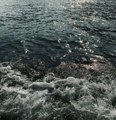 Foam sea reflection on the sea surface.