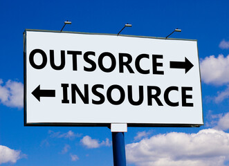 Outsource or insource symbol. Concept word Outsource or Insource on beautiful billboard with two...