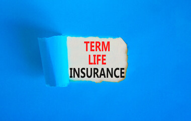 Term life insurance symbol. Concept words Term life insurance on beautiful white paper. Beautiful blue paper background. Medical term life insurance concept. Copy space.