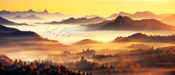 Schilderijen op glas High mountain peaks covered in clouds and mist © Inlovehem