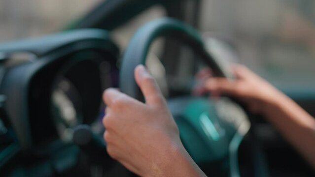 Woman uses an automatic transmission to drive while the car is running. Travel video concept