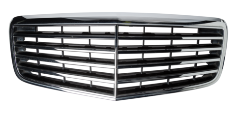 radiator grille on a white background made of shiny chromed metal is an element of the car body that protects and passes air to the engine. Design element and tuning replacement in the workshop.