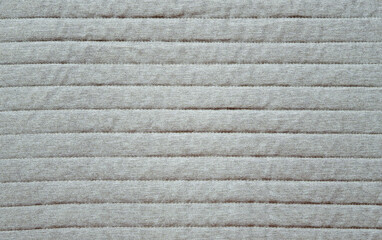 Light grey surface background with horizontal lines 