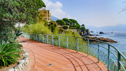 Genoa, Italy. The pathway of the 'Anita Garibaldi Promenade' on the Nervi coast, on a sunny and warm October day.