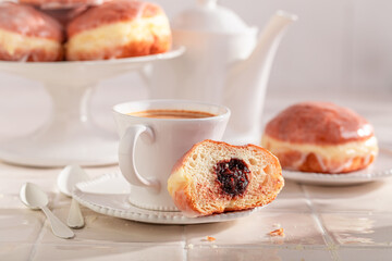 Traditionally and homemade doughnuts ready to eat in kitchen.