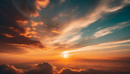 Obraz premium Beautiful sunset sky above the fluffy clouds illuminated in vibrant colors. Natural summer cloudscape