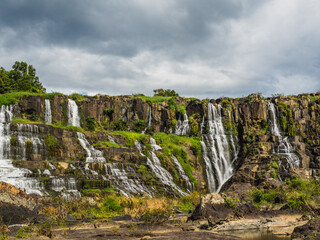Pongour (Elephant) waterfall near Dalat, Vietnam. Beautiful waterfall. Dramatic sky over Pongour...