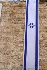 Blue and white flag of Israel with the Star of David.