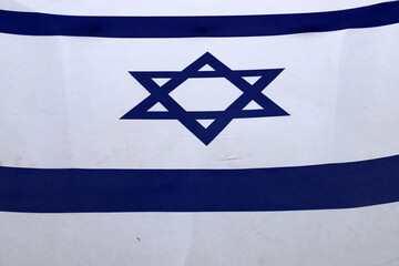 Blue and white flag of Israel with the Star of David.