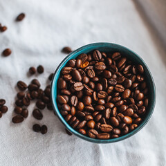 high-quality coffee beans in a cup, a blend of Arabica and robusta for the coffee machine