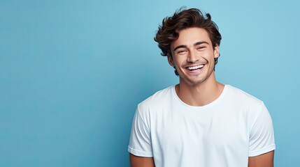 Dental banner. Young man with beautiful smile on blue background. Teeth whitening. Happy man - obrazy, fototapety, plakaty