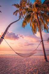 Beautiful silhouette of hammock on palm trees on tropical beach paradise at sunset. Carefree freedom tourism, summer nature, exotic shore coast. Tranquil travel landscape. Enjoy life, positive energy - obrazy, fototapety, plakaty