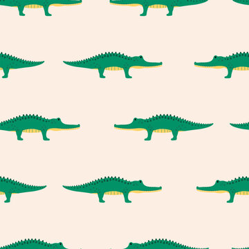 Seamless pattern with cute cartoon crocodiles. Funny baby print Suitable for children's fabrics, wrapping paper, children's wallpaper, textiles, packaging.