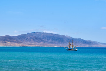 Ship near the Jandia lighthouse in Fuerteventura Spain