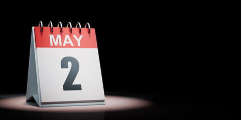 May 2 Calendar Spotlighted on Black Background
