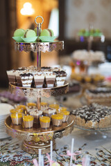 Delicious sweet cakes and desserts at the festive candy bar