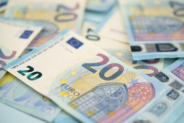 many 20 euro bills close-up mixed randomly