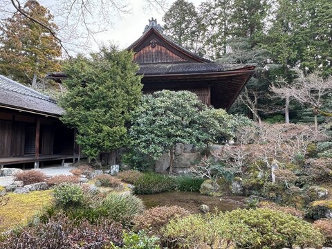 Historical building at a Japanese palace garden. Photo taken at Shugakuin Imperial Villa of Kyoto, Japan on a sunny day in winter.