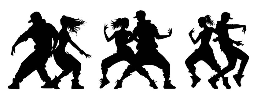 Silhouettes of Hip Hop Dance Partners in Sync