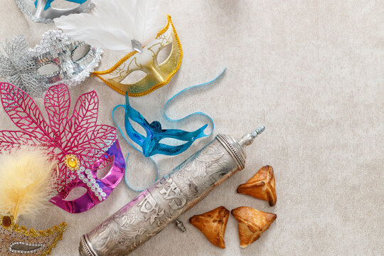 Scroll of Esther and haman's ears cookies. Purim Festival object