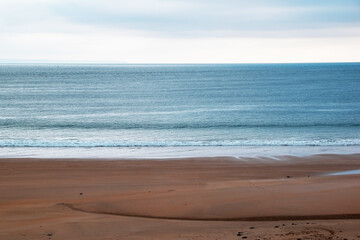 Beautiful beach in the morning light. Seascape with sea and sky.