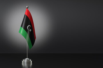 Small National Flag of the State of Libya on a Black Background. 3d Rendering - obrazy, fototapety, plakaty