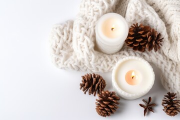 Fototapeta na wymiar Winter Composition with Candlelight, Anise, and Pine Cones on Knitted Sweater