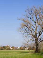 Countryside landscape with small village - 732737506