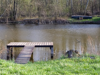Wooden pier on the river - 732737700