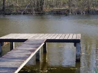 Wooden pier on the river - 732737745
