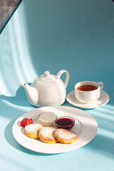 Delicious Breakfast of Cottage Cheese Pancakes with Fresh Strawberries and Sour Cream