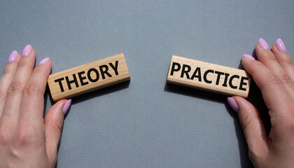 Theory or Practice symbol. Concept word Theory or Practice on wooden blocks. Businessman hand....
