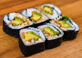 Sushi Roll Platter on wood background. Salmon sushi set, serving food for restaurant, menu, advert or package, close up, selective focus