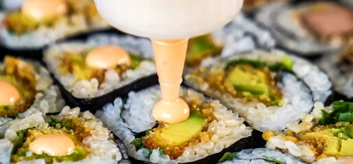 Sushi Roll Platter on wood background. Salmon sushi set, serving food for restaurant, menu, advert or package, close up, selective focus