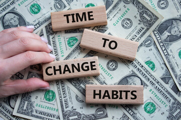 Time to Change Habits symbol. Wooden blocks with words Time to Change Habits. Beautiful dollar background. Psychologist hand. Psychology and Time to Change Habits concept. Copy space. - obrazy, fototapety, plakaty