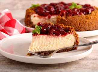 Homemade cherry topping cheesecake slice