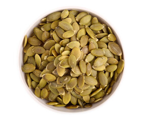pumpkin seeds over white background